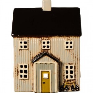 Hus til fyrfadslys Visby cykel foran sort tag