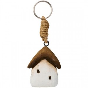 Nøglering hvidt hus brunt tag