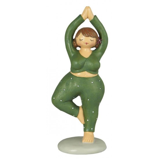 Dame i yoga positur grøn