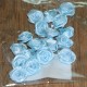 pose med små Blomster lyseblå